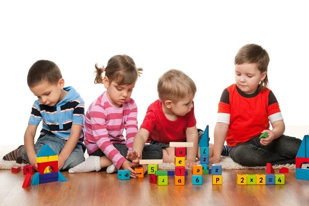 Boy with Autism Parallel Playing