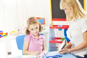 Girl speech therapy